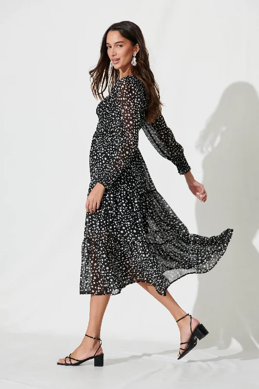 jaseline-midi-dress-in-black-with-white-spot