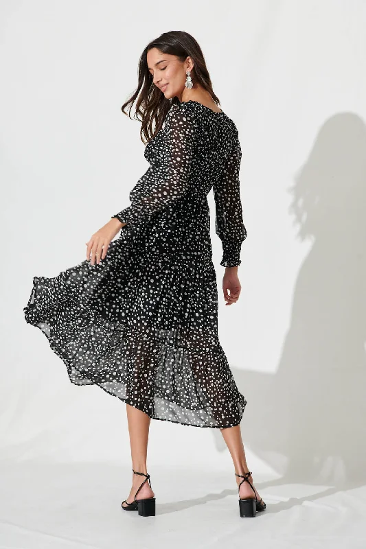 jaseline-midi-dress-in-black-with-white-spot